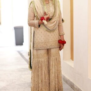 Elegant Embroidered Outfit with Green Accents